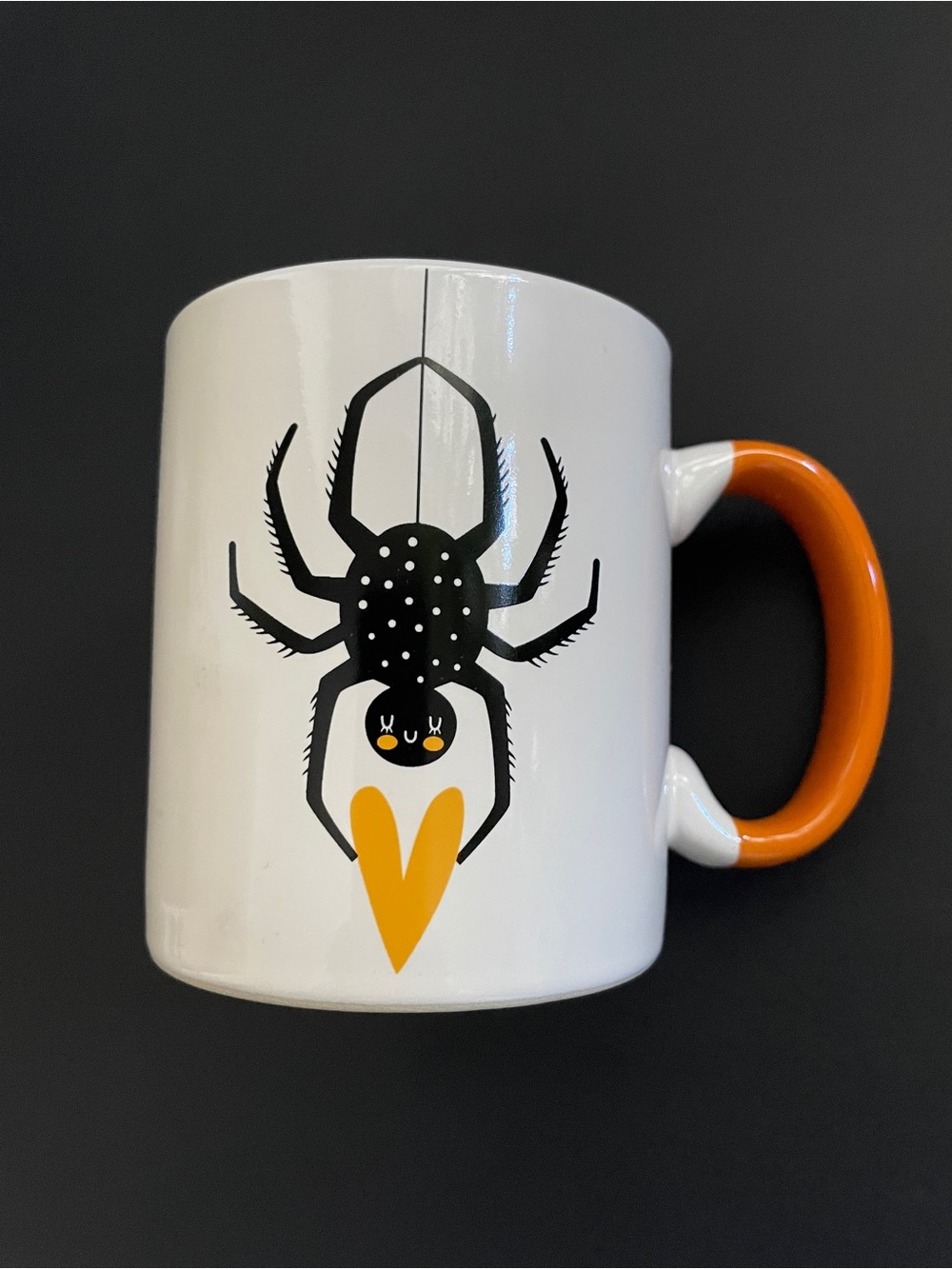 Croton White Ceramic Mug with Black Spider and Orange Handle